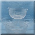 G22. Set of 10 etched glass dishes. 
